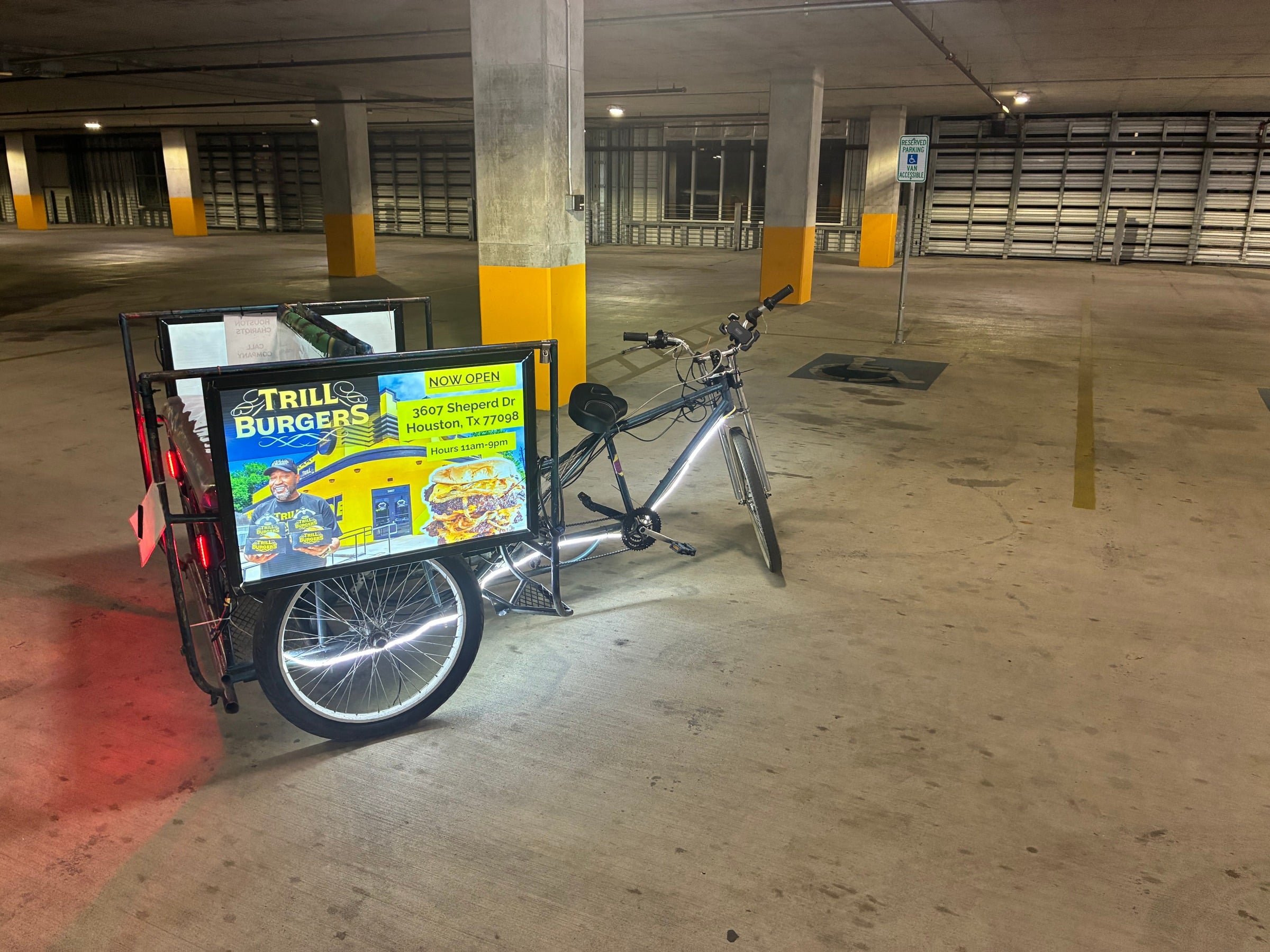 A branded City Yacht Tours pedicab at an event