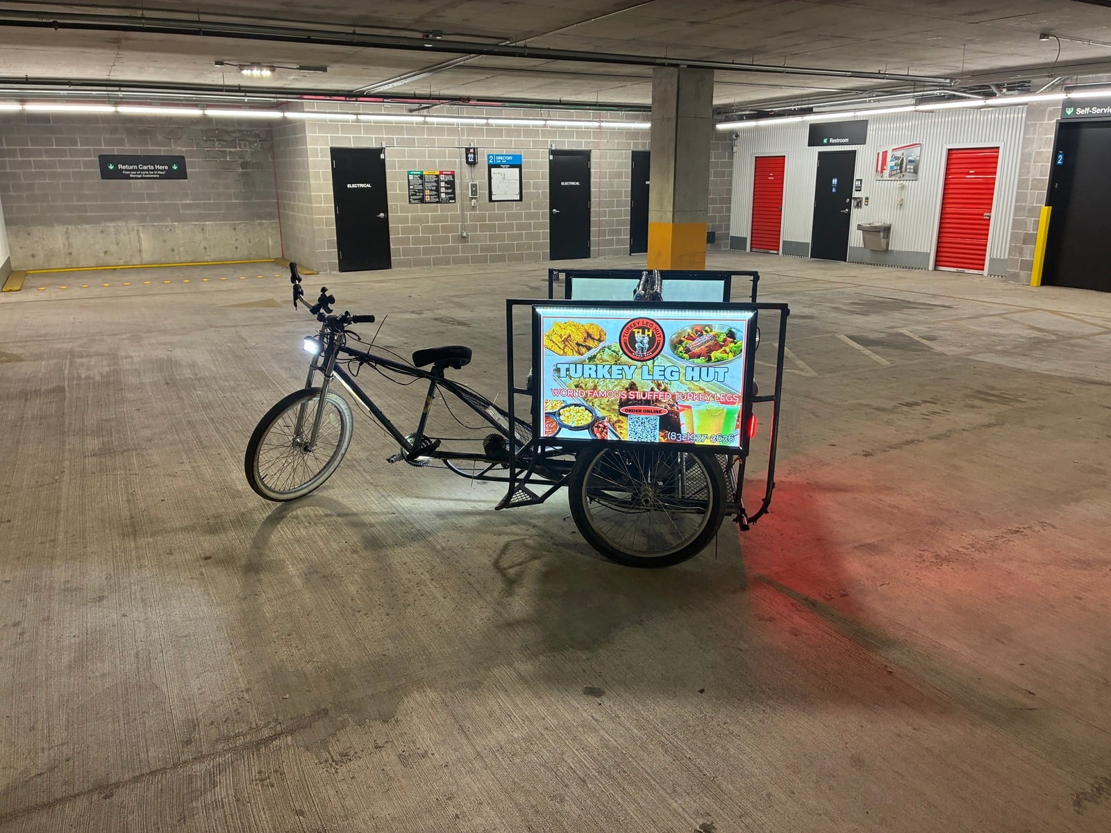 A colorful City Yacht Tours pedicab ready for a Houston ride