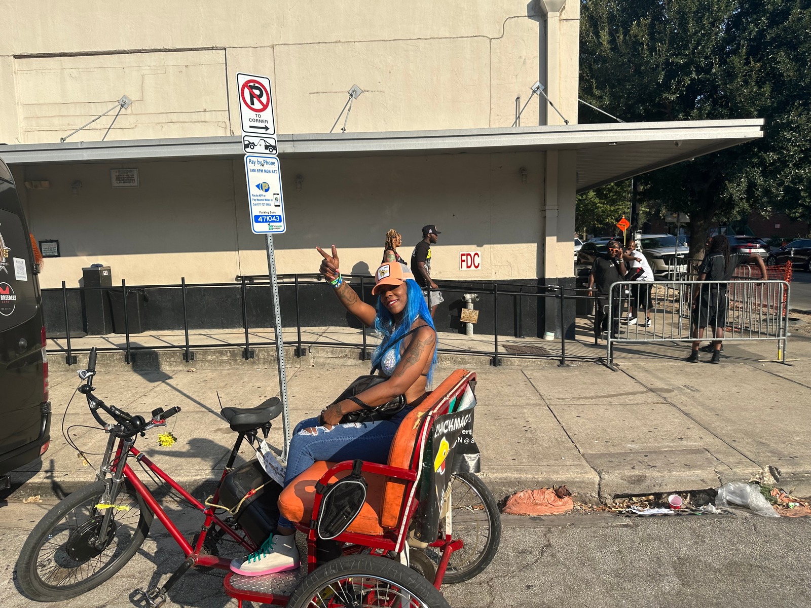 Guest riding through Houston on a City Yacht Tours pedicab